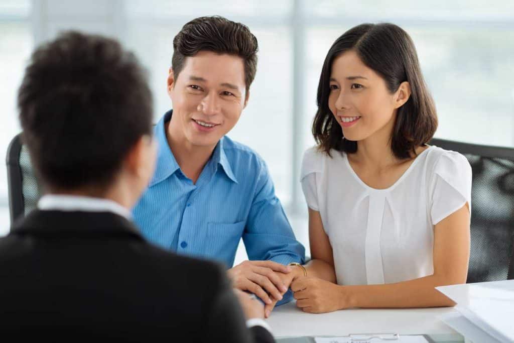 Happy Couple meet with Builder